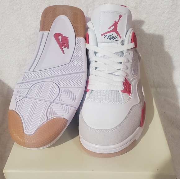 Nike Air Jordan 4 White and Red Sneakers
